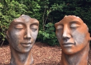 Steinguss Mann & Frau Paar Gesicht Rostpatina